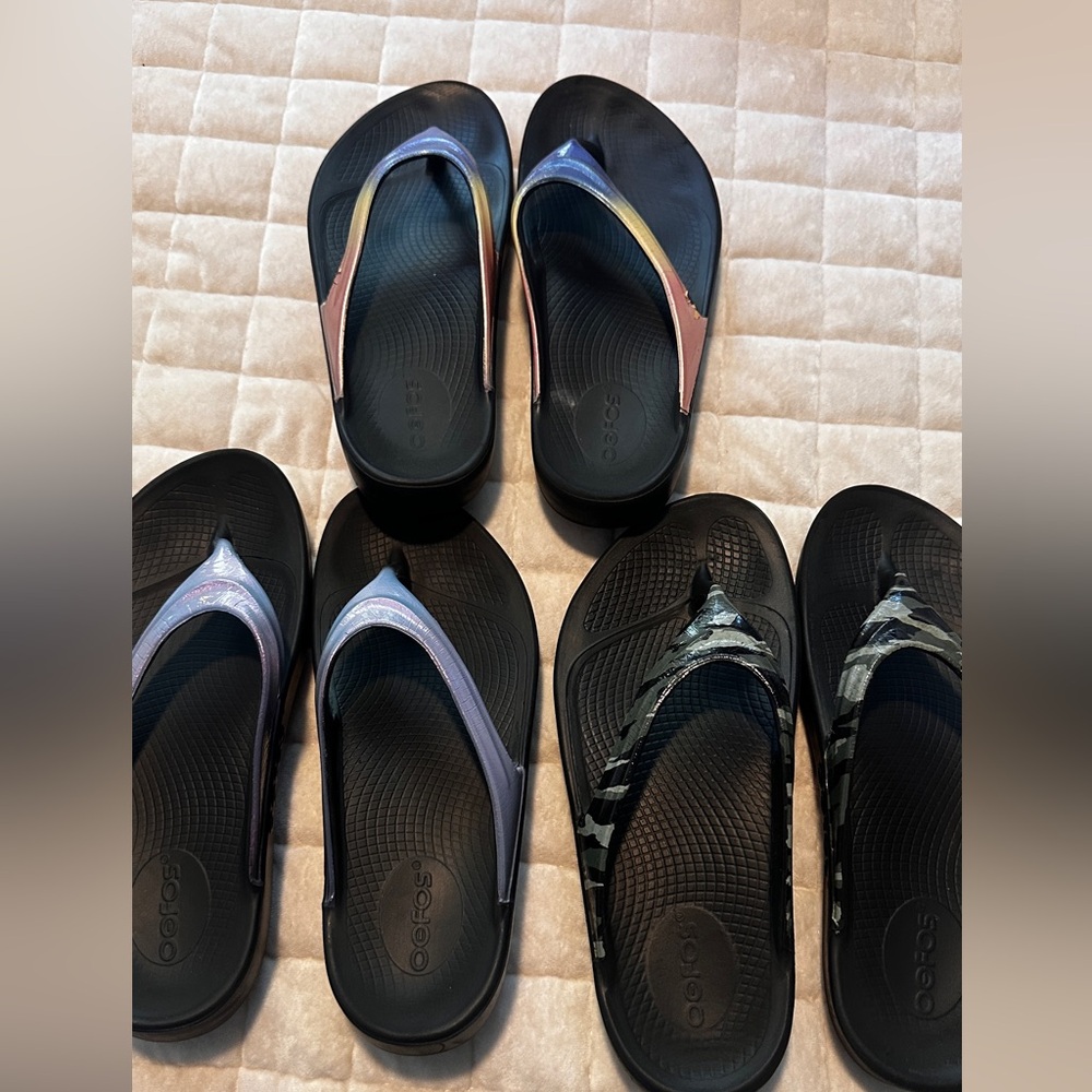 Three pair of Oofos  Flip Flops